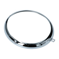 Headlight rim, screws at 9:00