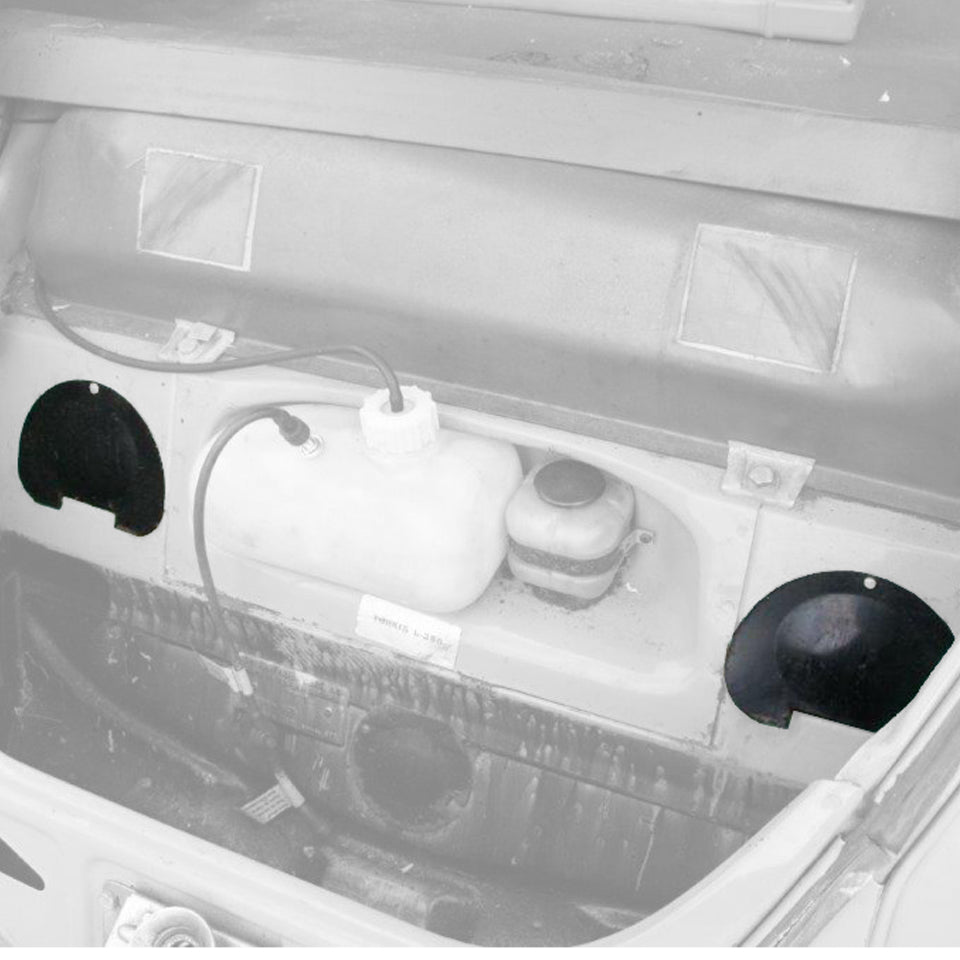 Inspection cover steeringbox sparewheel well