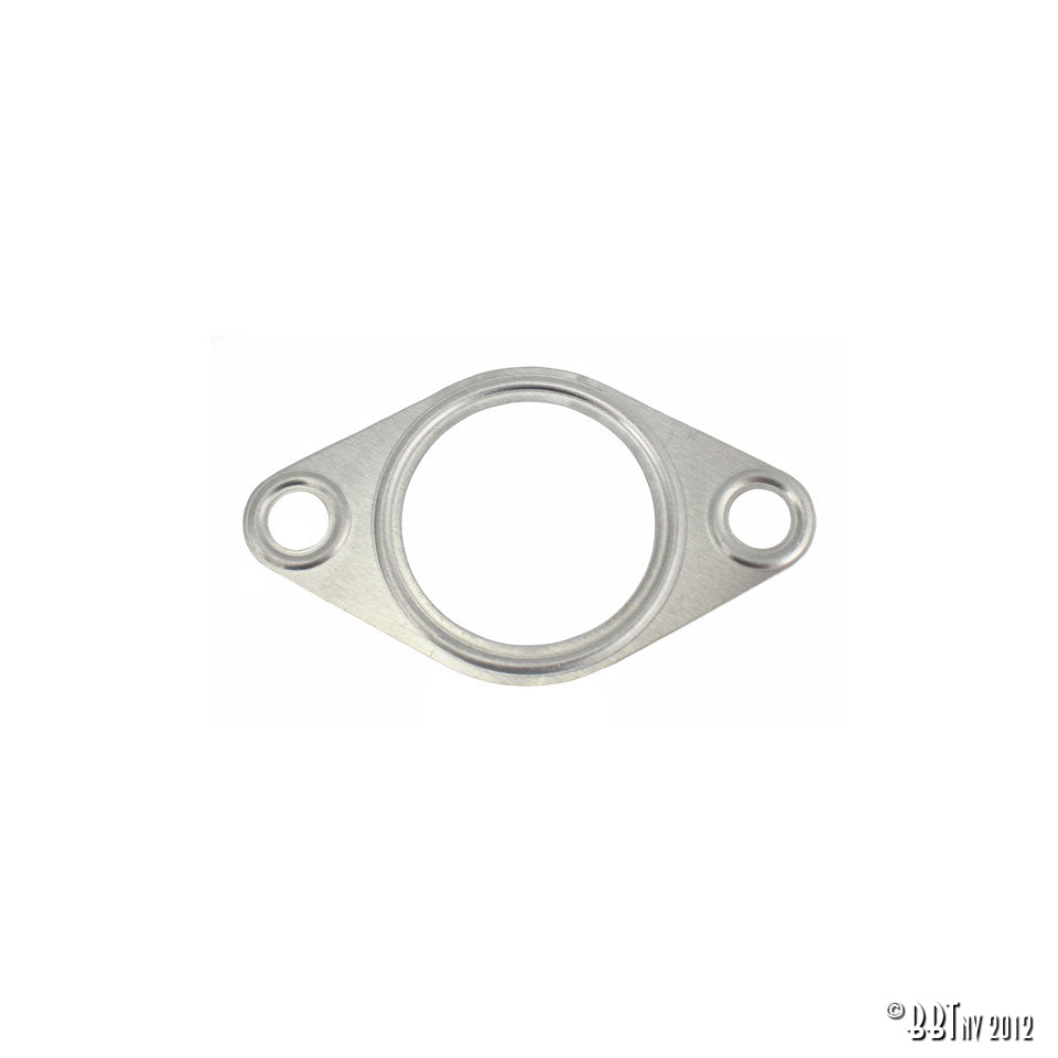 Gasket under manifold